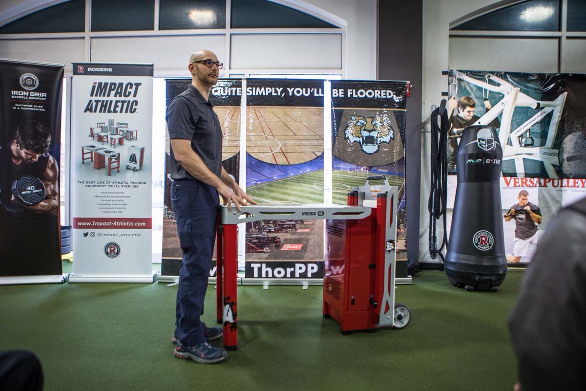 SMARTERTeam's tweet photo. The @Impact_Athletic Medic XL table really can hold a LOT of weight. We had people standing on top of it at #5thSCADVA to prove that very point. See for yourself at the next clinic or conference on https://t.co/plG845eAri. https://t.co/YUJhrj0mHc