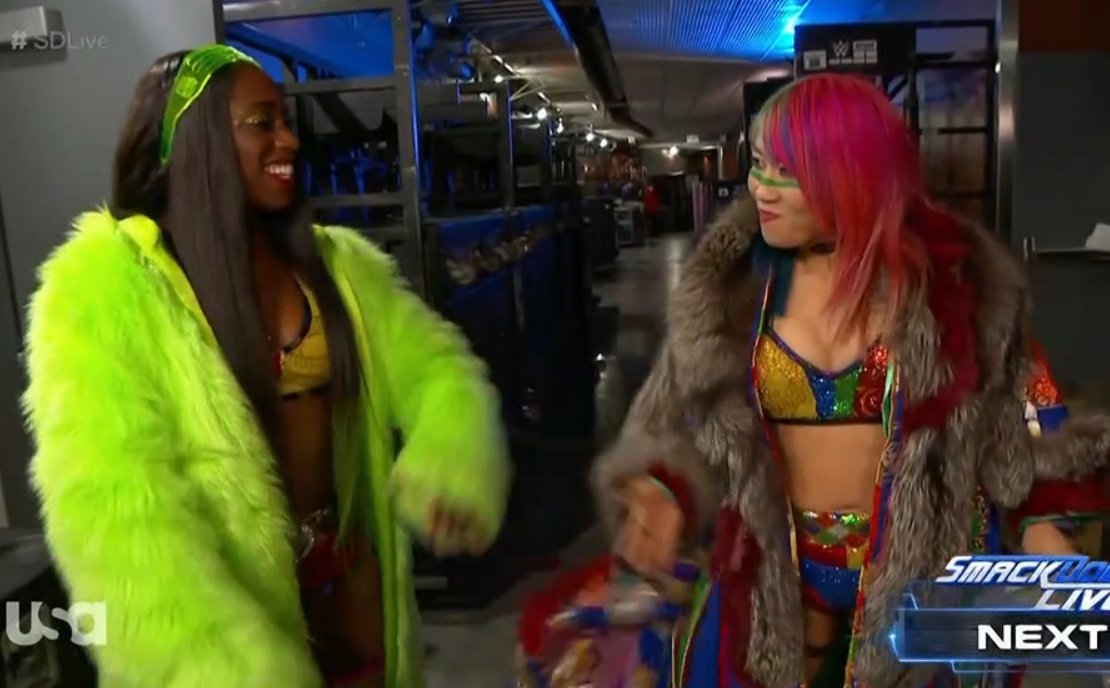 WrestlingInc's tweet photo. Naomi and Asuka take on Sonya Deville and Mandy Rose next. #SDLive #MatchingCoats https://t.co/9jSMSHc0RT