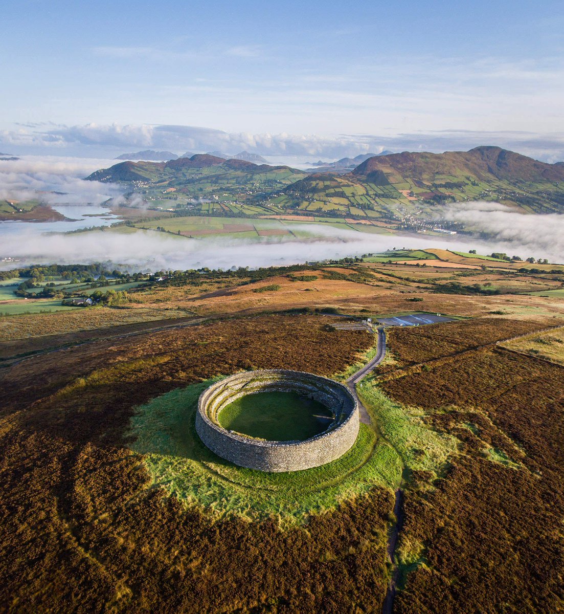 Stone Fort of Grianán of Aileach - royal site probably built in the 8th/9th century, with an astonishing view on the landscape of Donegal. As many sites in the area, a target of Viking raids. 
#archaeology
#aerialphotography #hillfortwednesday
Drone photo: tom-archer.com