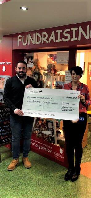 Chris Rowberry from Hatton Electrical Wholesalers handing over a cheque to Kirsty White from Birmingham Children’s Hospital Charity. The money was generously donated by the attendees of AWEBB’s AGM held in September 2018. <a href="/AWEBB_LTD/">AWEBB</a> <a href="/Bham_Childrens/">Bham Children's Hosp 💙</a>