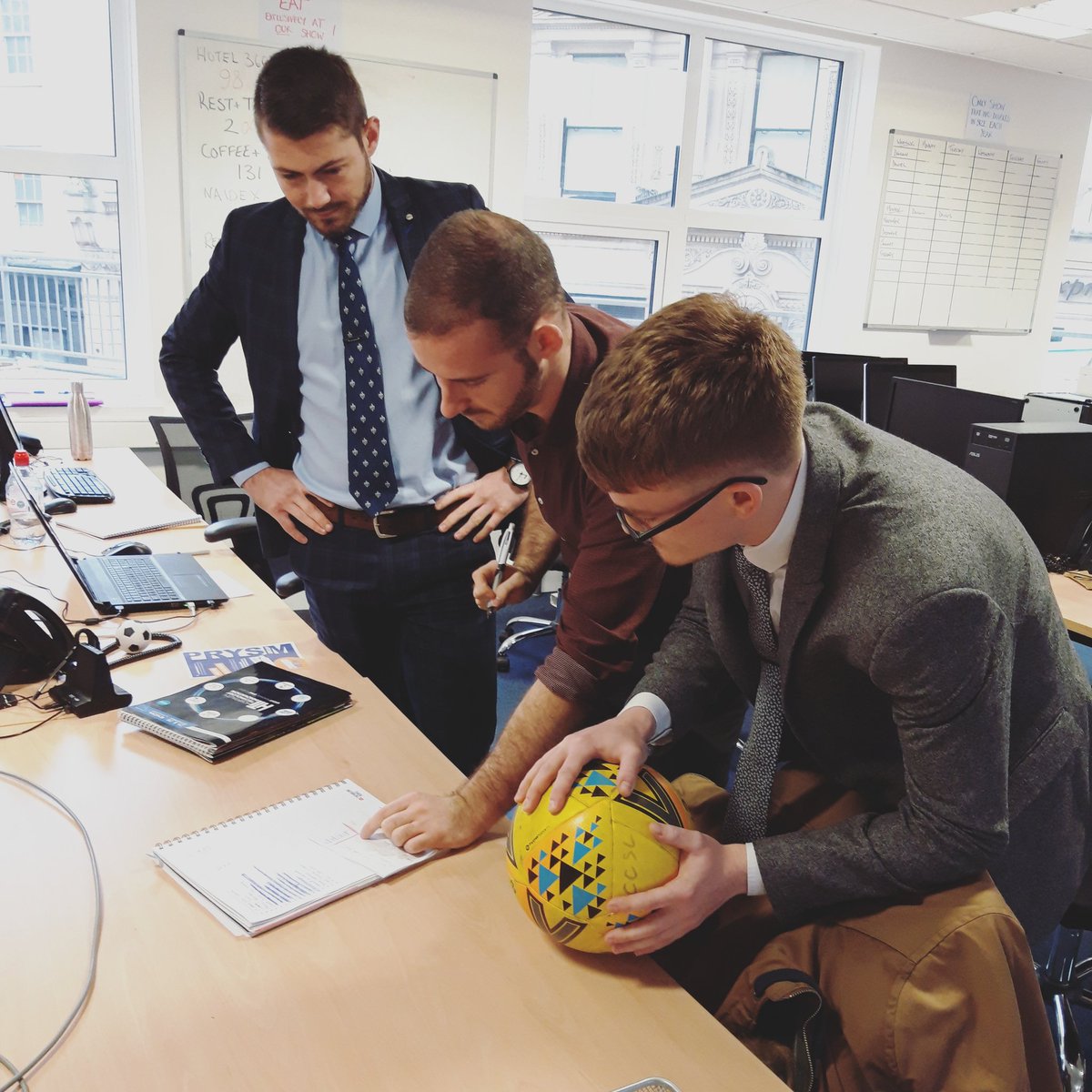 JWPrysm's tweet photo. Serious faces whilst deciding the football teams for tonight's office game ⚽️😁🇬🇧 #careers #sales #bristoljobs #JWPrysmlife https://t.co/AUxP0FfeyF