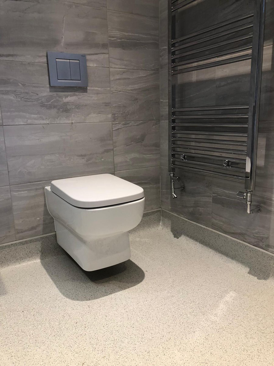 This #Bathroom designed and instaled by Apollo kitchens has a wall hung toilet, wall hung vanity unit and basin with soft close draws, #Impey #Aqua-Grade #wetroom system with Vinyl floor, create a beautiful open space within your bathroom.