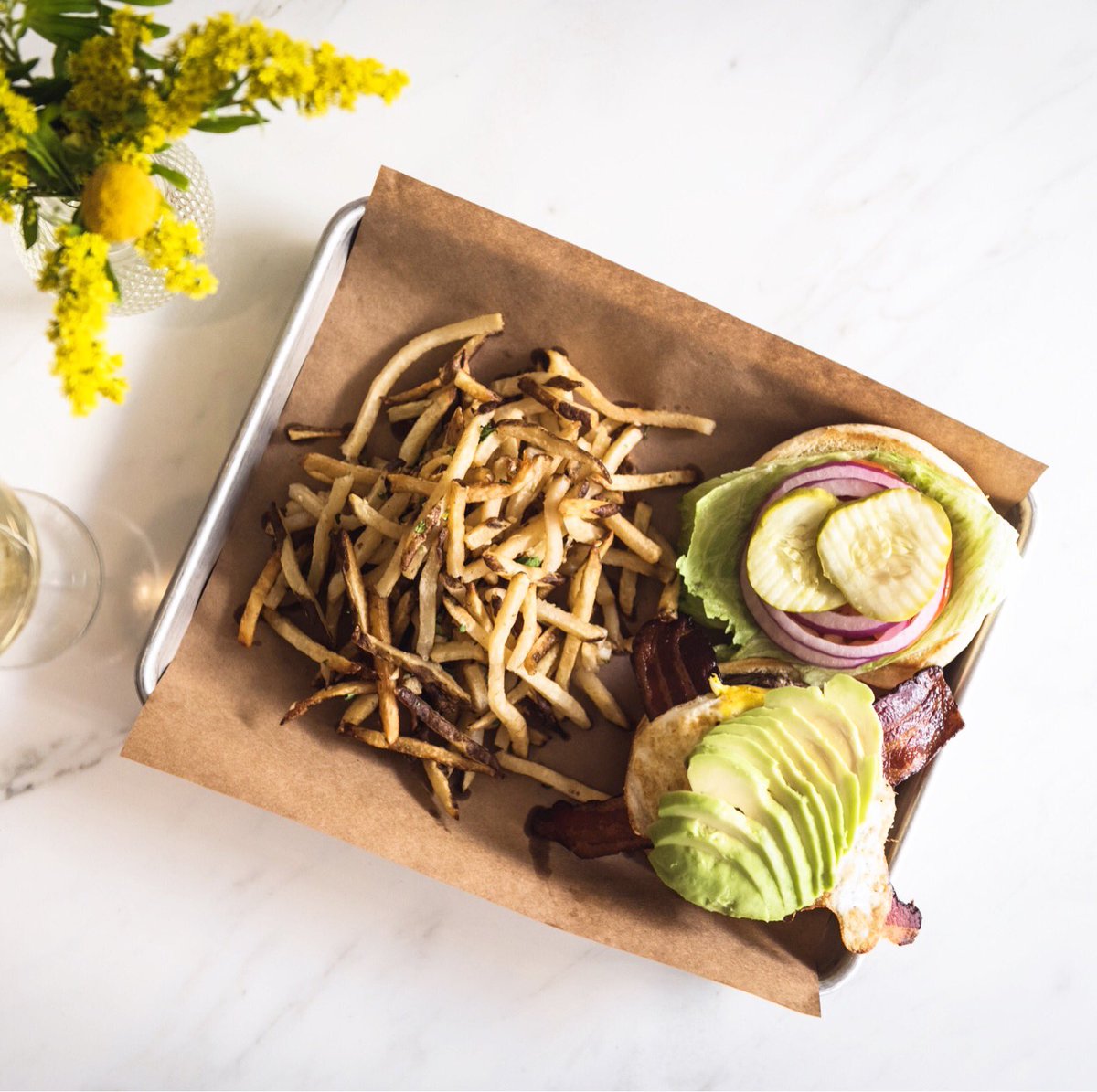 woolworthon5th's tweet photo. Get out of the house while you still can - family time is fun but treat yourself to some you time before it starts 🍔
• • • 
woolworth burger : 8oz bear creek beef, american cheese, lettuce, tomato, onion, pickle, bacon, avocado, fried egg, texas ketchup &amp; garlic fries. https://t.co/EruON22WgN