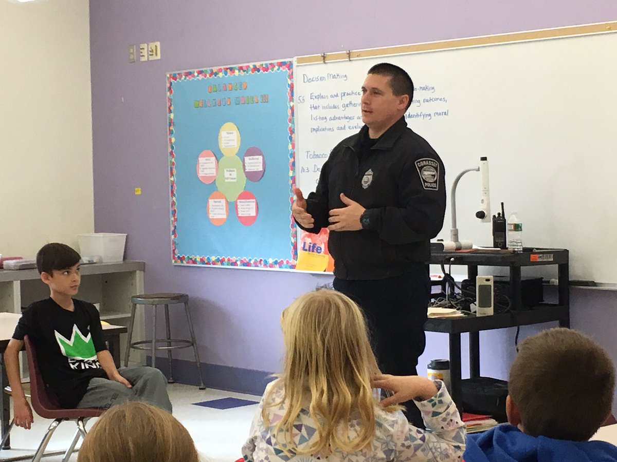 DeerHillSchool's tweet photo. School Resource Officer Greg Taylor speaks about responsible decision making and the effects of direct and indirect influences to Mrs. Hamlin’s health class. @CohassetPolice #proudtobedeerhill #proudtobecps https://t.co/jFGSKRnsRw