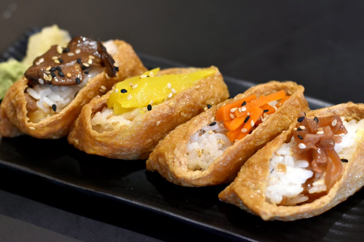 TaboSushi's tweet photo. A @cheftakashi favorite, grab &amp; go our Inari Sushi [ soy-braised tofu pocket ] pickled daikon, pickled yama gobo, kanpiyo, egg, pea, shiitake mushroom 🧡🧡🧡
...
#inarisushi #keeponrollin #japanesefood #sushi #grabandgo #chicagoloop #tabotogo #delivery #happysushi https://t.co/CQSrSppqlN