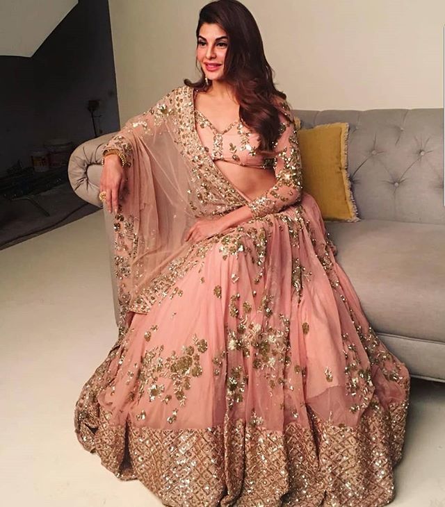 JivaCouture's tweet photo. The gorgeous @jacquelinef143 stuns in this bridal look by @asthanarangofficial - Shop #asthanarang  at JIVA!

https://t.co/RFkTrQggzT

#jacquelinefernandez #indianfashion
#indiandesigner #indiancouture  #indianclothing #jiva #jivacouture #desicouture #de… https://t.co/0MsECUxdh0 https://t.co/WgZ4WX5VSe