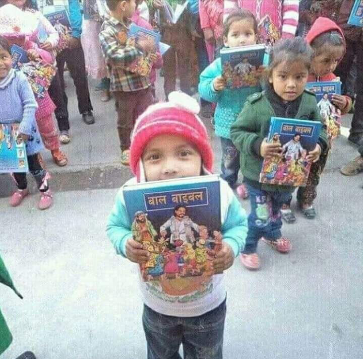 धर्मलाई ब्यापारीकरण गर्ने धर्मका ब्यापारीहरुले बच्चाको हातमा पनि बाइबल थमाएछन् ! मेरो धर्मले मलाई हिन्दु हुन अरुलाई हिन्दु बनाउन सिकाएन मानव हुन सिकायो र मानबता भन्दा ठुलो धर्म केही छैन भनेर सिकायो ।