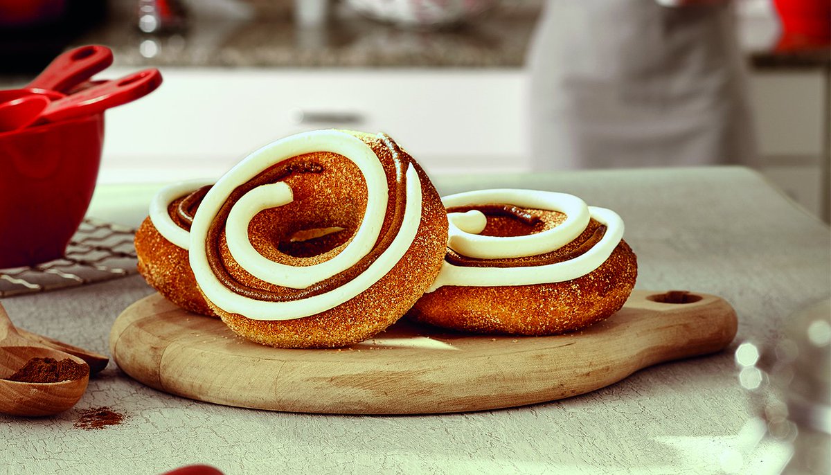 Our new Cinnamon Swirl Doughnut: hand-tossed in cinnamon sugar and topped w...