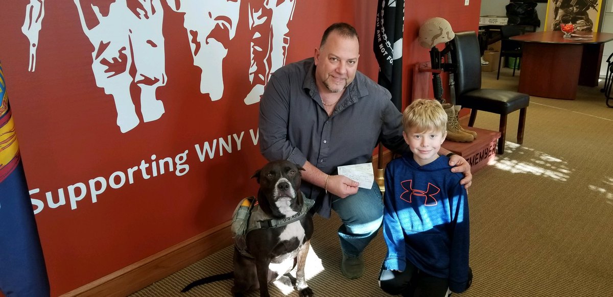 This awesome little 9y/o (Gabriel Salzler) decided that for his birthday, instead of presents, he wanted to collect #donations for our #PawsitiveForHeroes program. #Bubba  greeted him to also say thank you. Thank you Salzler family for raising such an amazing son. #awesome