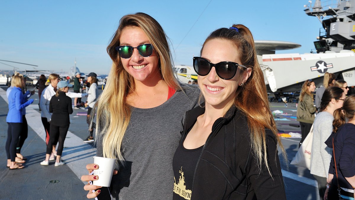 PacificSD's tweet photo. SPOTTED: Yogis at Sweat for Service experienced a dynamic yoga session aboard the @USSMidwayMuseum to raise funds for the families of fallen soldiers | Pics by #RickNocon | More here: https://t.co/tQ1qus75ee https://t.co/VFdpTSNh7V