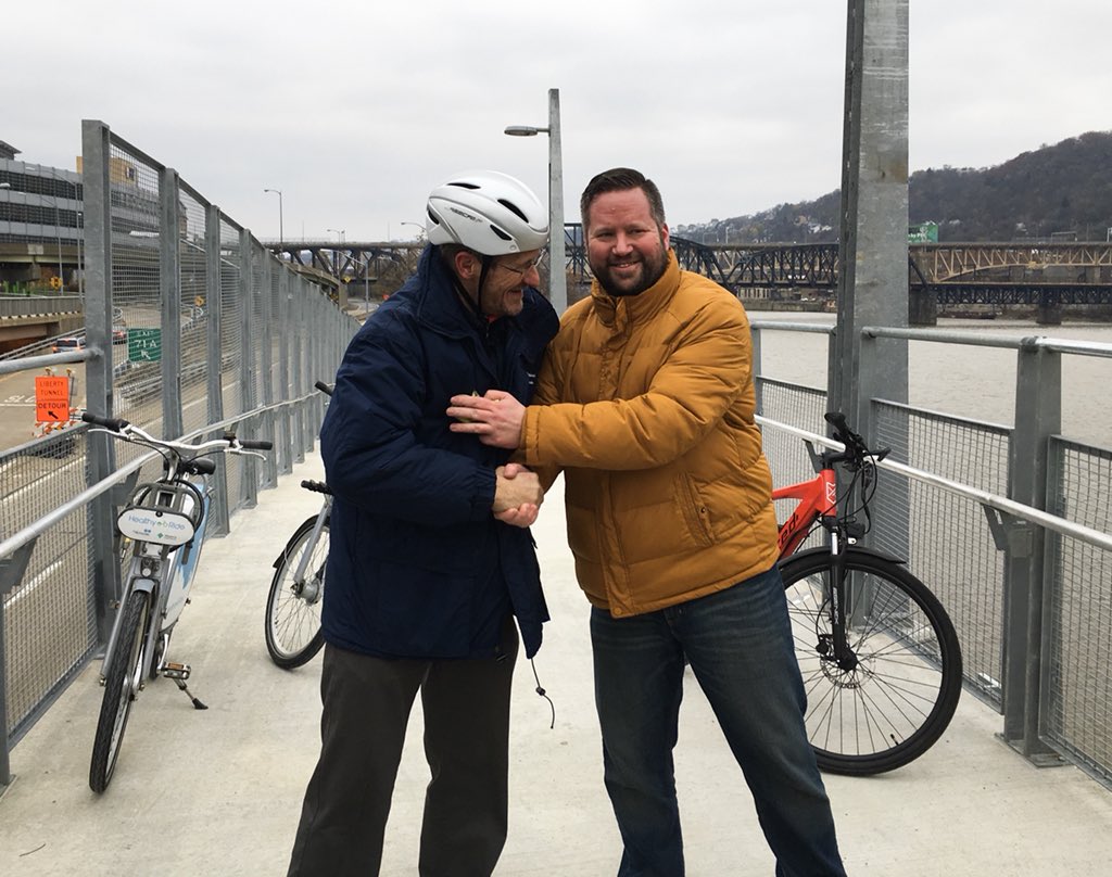 Teamwork at its finest! Assistant Director Pat Hassett and Deputy Director Jeff Skalican cut the “ribbon” for the new Mon Wharf Switchback Ramp. It is open and ready to be enjoyed by the public! #monwharfswitchback