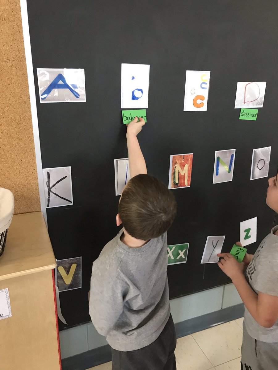 mllemclaughlin's tweet photo. Having fun with our magnetic word wall! We take on and off letters and words to practice #frimm #lkdsbfsl #sjm #engaged #lesactions https://t.co/0Ix2FEyyPL