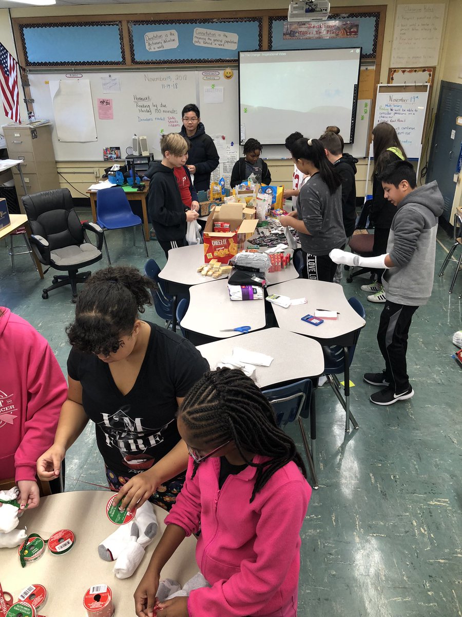 Stuffing socks with snacks...a sweet treat and warm feet 🤗 #VEMServiceDay