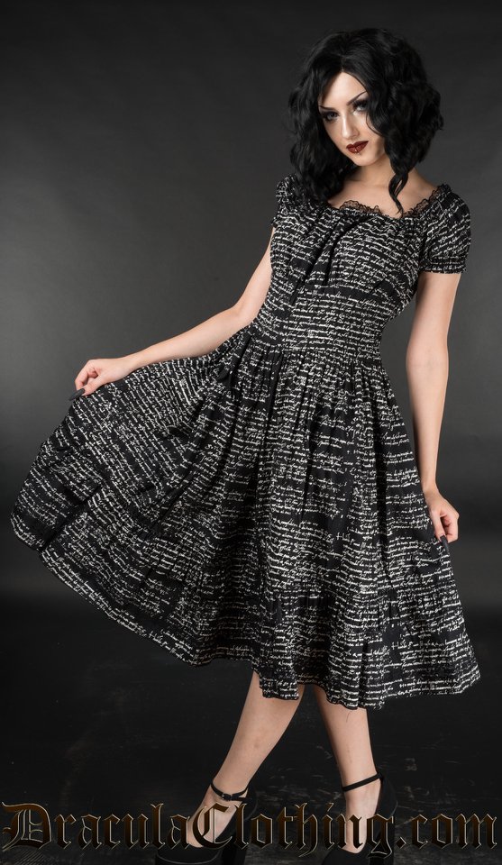Littlebooteek's tweet photo. This beautiful dress is covered in writing, making it the ideal dress for writers and book lovers alike! https://t.co/hRVMRSmET3 

#LittleBooteek #gothwear #SpookyKook #FunnyFlaps #gothicclothing #SmallBusiness https://t.co/8jrPWbVJce