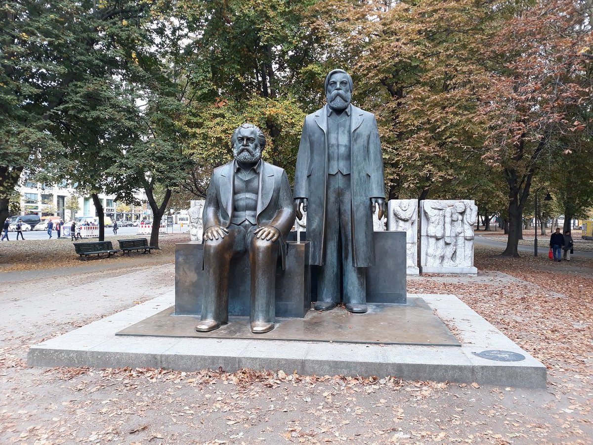 7\\ Statue of Karl Marx & Friedrich Engels, double life-sized. Marx’s lap is all shiny from tourists touching and sitting on it. Once located opposite the now demolished Palace of the Republic in East Berlin, it has been moved due to subway construction to a less noticeable spot.