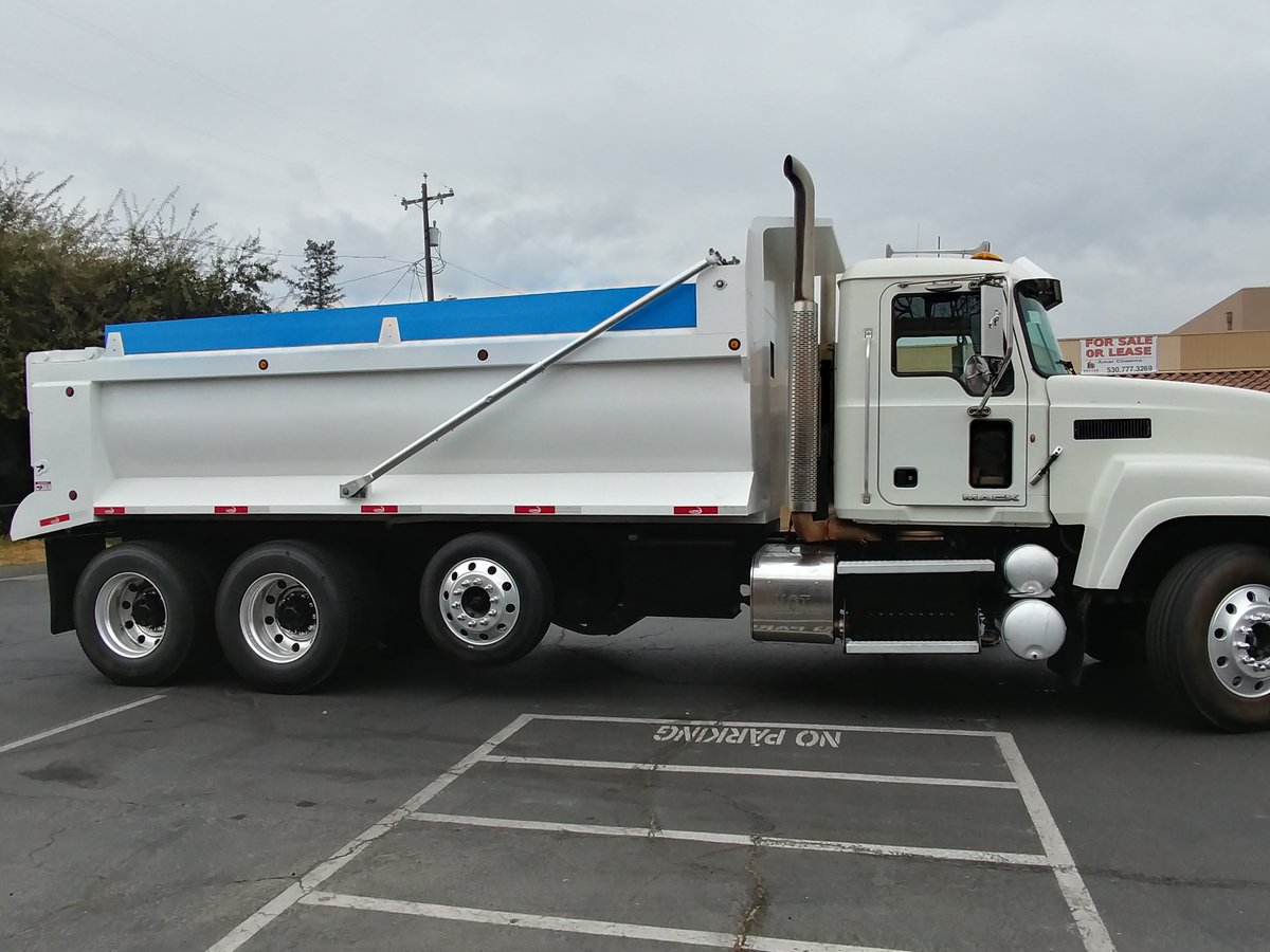 Our vinyl guy - Jim - worked hard to apply the vinyl for "Rock-It" Trucking's new dump truck. We're happy to say that he got it all done before it rained.