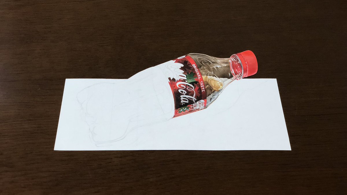 紙にコーラ置いただけやん 色鉛筆で書かれたコーラのイラストがマジで本物にしか見えなくてすごい Togetter