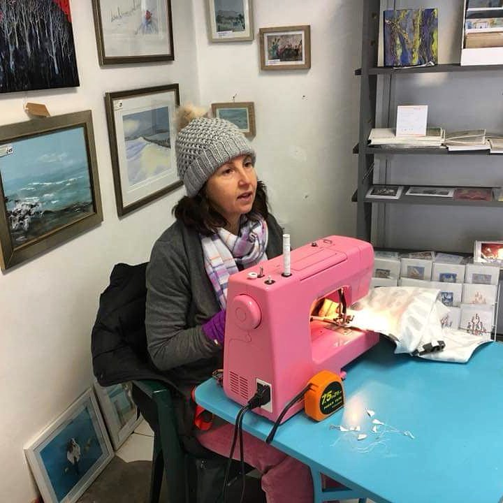 Key_ArtSpace's tweet image. #ThrowbackThursday one from the ArtSpace archives. Here's Maggie Moo wrapped up in her winter layers busy making on her sewing machine. This was taken in last year's pop up shop in #Keynsham ❤️ This year you can find us on the opposite side of the road, upstairs @templestcanteen