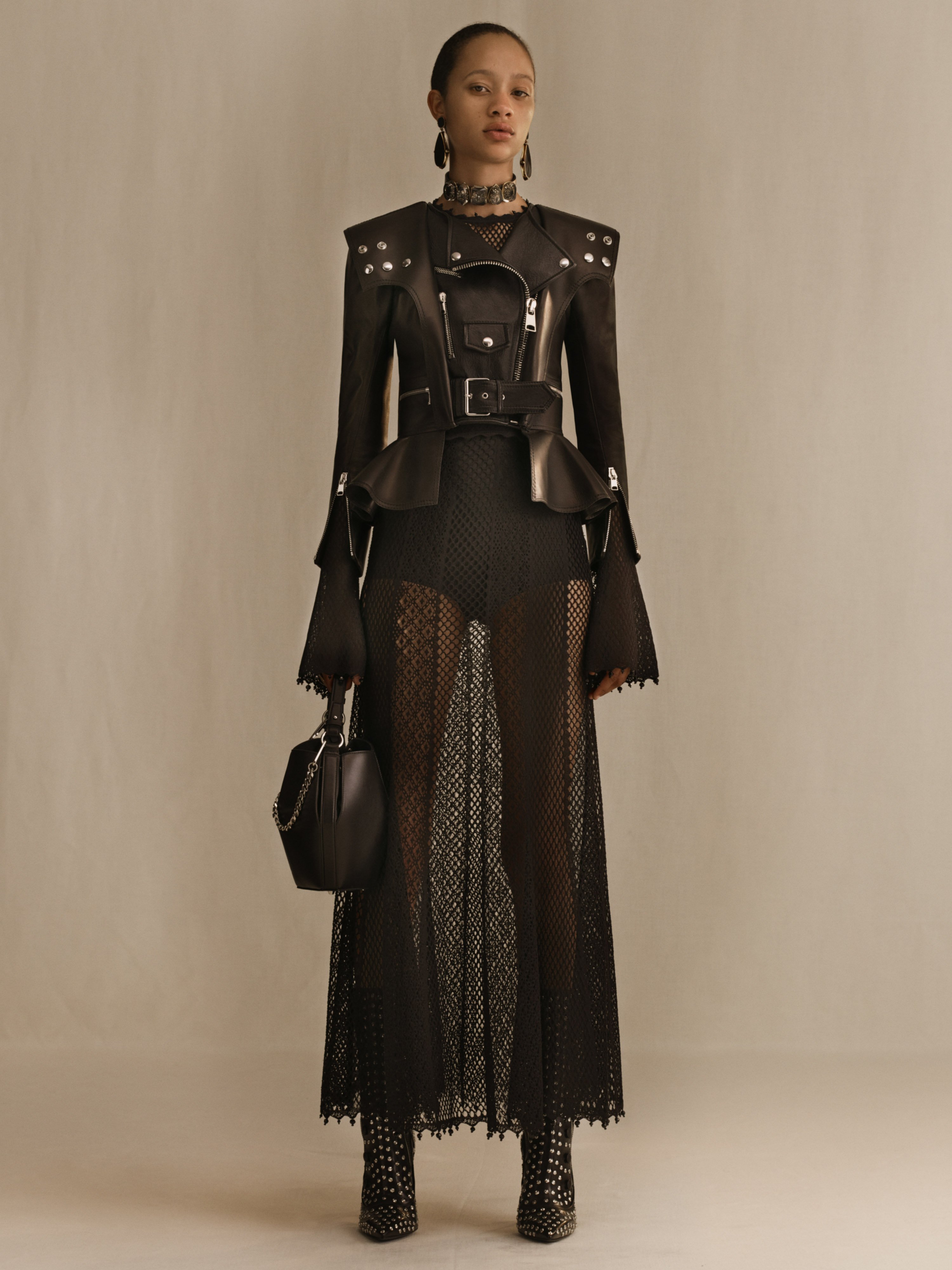 X Alexander McQueen A knitted engineered mesh dress and Victorian inspired biker jacket. From the Alexander McQueen Spring Summer 2019 pre collection. Explore https t I8V0bm7YJg McQueenPreSS19 Alex...