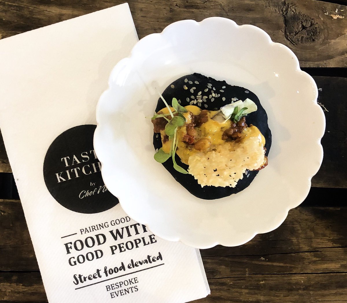 foodandhome_sa's tweet photo. Lunch is served, thanks to the @Taste_kitchen_! This charcoal ciabatta kota topped with spicy mince and a Parmesan tuille is exactly what we need to get us through deadline today! #foodgasmwithchefnti https://t.co/GiNVNMSOKu