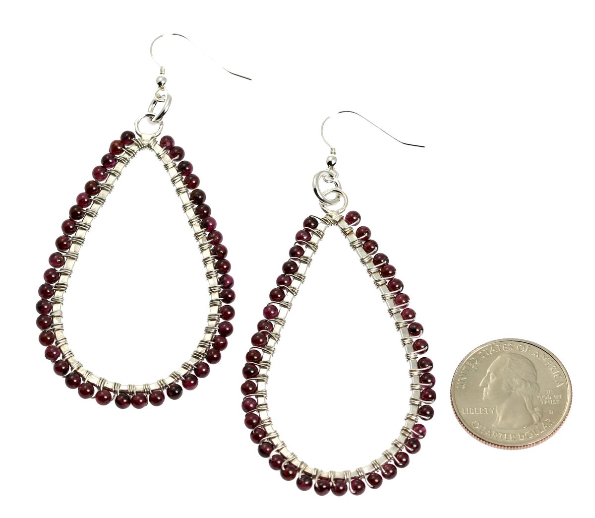 New! Attention-getting Hammered Silver Garnet Tear Drop Earrings johnsbrana.com/products/hamme… #JohnSBrana #Earrings #Handcrafted