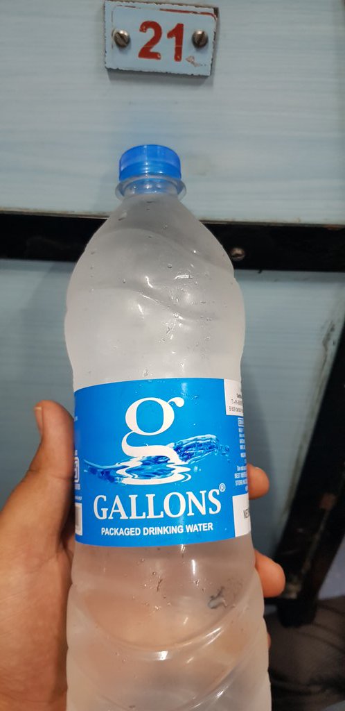 Singh9579's tweet photo. Now being thirsty and dealing with inhuman cruelly snatching bottle of IRCTC on board waiter, I'm forced to buy this below bottle paying excess amount of Rs 20 https://t.co/kDa3qx3HLM
