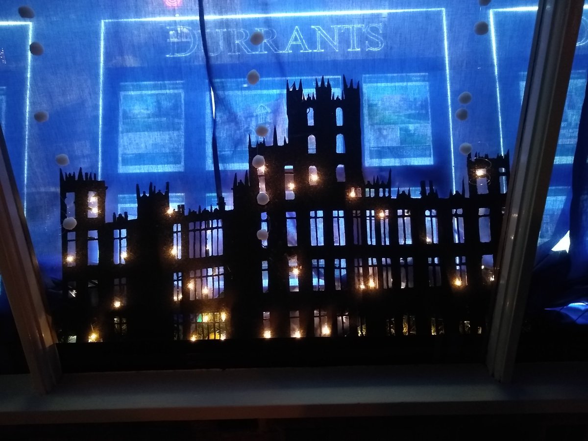 DParravani's tweet photo. Our Downton Abby themed window display for this Saturday evening Christmas lights switch on! We done team! #Southwold @DurrantsResi https://t.co/UizrQvAZj3