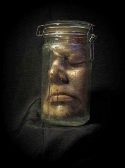 A trophy for me
I see
For he wasn't so smart
When he cried for help
As the clever did separate his face
So I look and smile
At his denial
And the lost twinkle in his eyes
Poor chap
So here he stays
For rainy days
As my pleasure
Grows like a flower
Sweet scent of desire