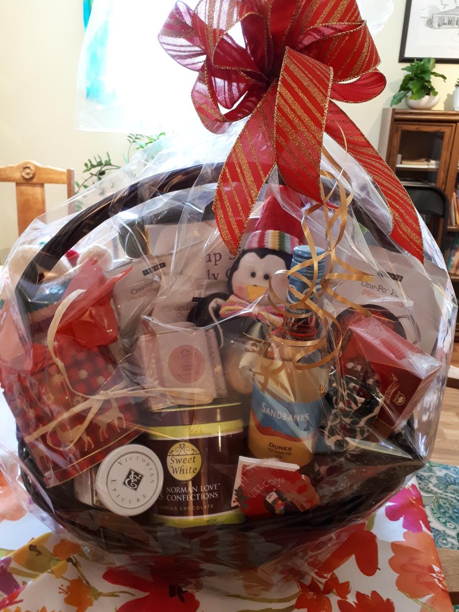 Thanks to volunteers and staff who contributed to our Festival of Trees basket, and a special shoutout to Michelle at Flowers By Marvin for making it look so gorgeous. Come bid on this beauty at <a href="/isaiah_tubbs/">Isaiah Tubbs Beach Resort</a> and help raise money for <a href="/pecmhf/">PECMH Foundation</a>