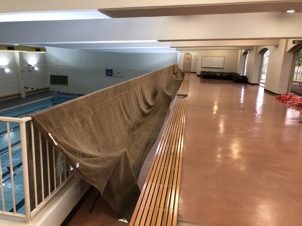 groundsstaff's tweet photo. MGS Groundstaff doing all they can to have the best possible playing conditions for tomorrow. Trying to dry our Hessian along the pool railing It has been a challenging week for the curators to say the least. @APS_Sport @BlueBaggy #thinkoutsidethe https://t.co/kiWxSiFzau