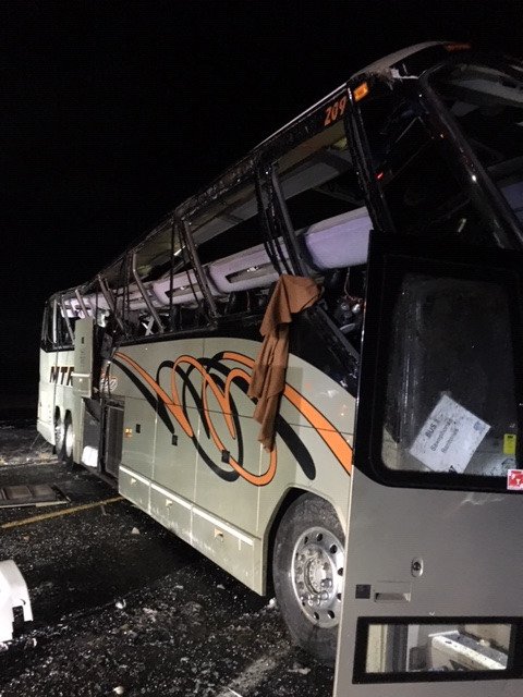 wspd6pio's tweet photo. #Final Update for tonight:  UW Band Charter Bus has been tipped back up and is getting ready to be towed.  All band instruments and luggage removed form storage area. #UWBusCrash https://t.co/tpTEFHhBTz