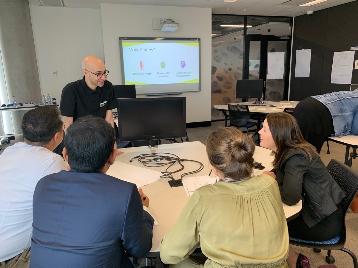 1stConf's tweet photo. It's @samanattarian And Dave Clifford teaching folks how to create their own agile game. #be1st https://t.co/IV9NDwbX5U