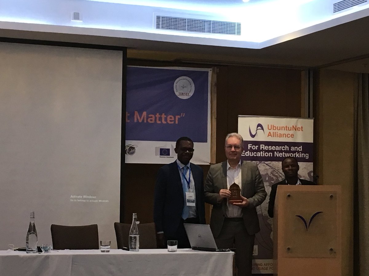 AC3_News's tweet photo. .@GEANTnews CEO Erik Huizer @Milkshake attending #UC2018zanzibar as the first GÉANT CEO to ever attend a UbuntuNet Connect conference. @UbuntuNet CEO Pascal Hoba offering a token of appreciation, the traditional Zanzibari door. https://t.co/AoRUwgbTks