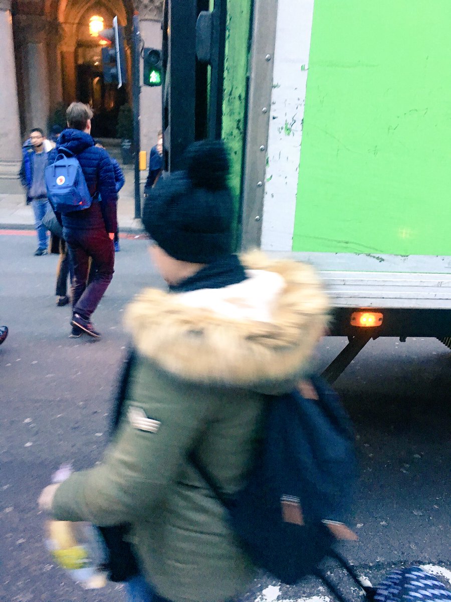 People are going round the lorry as they cannot cross straight over.
