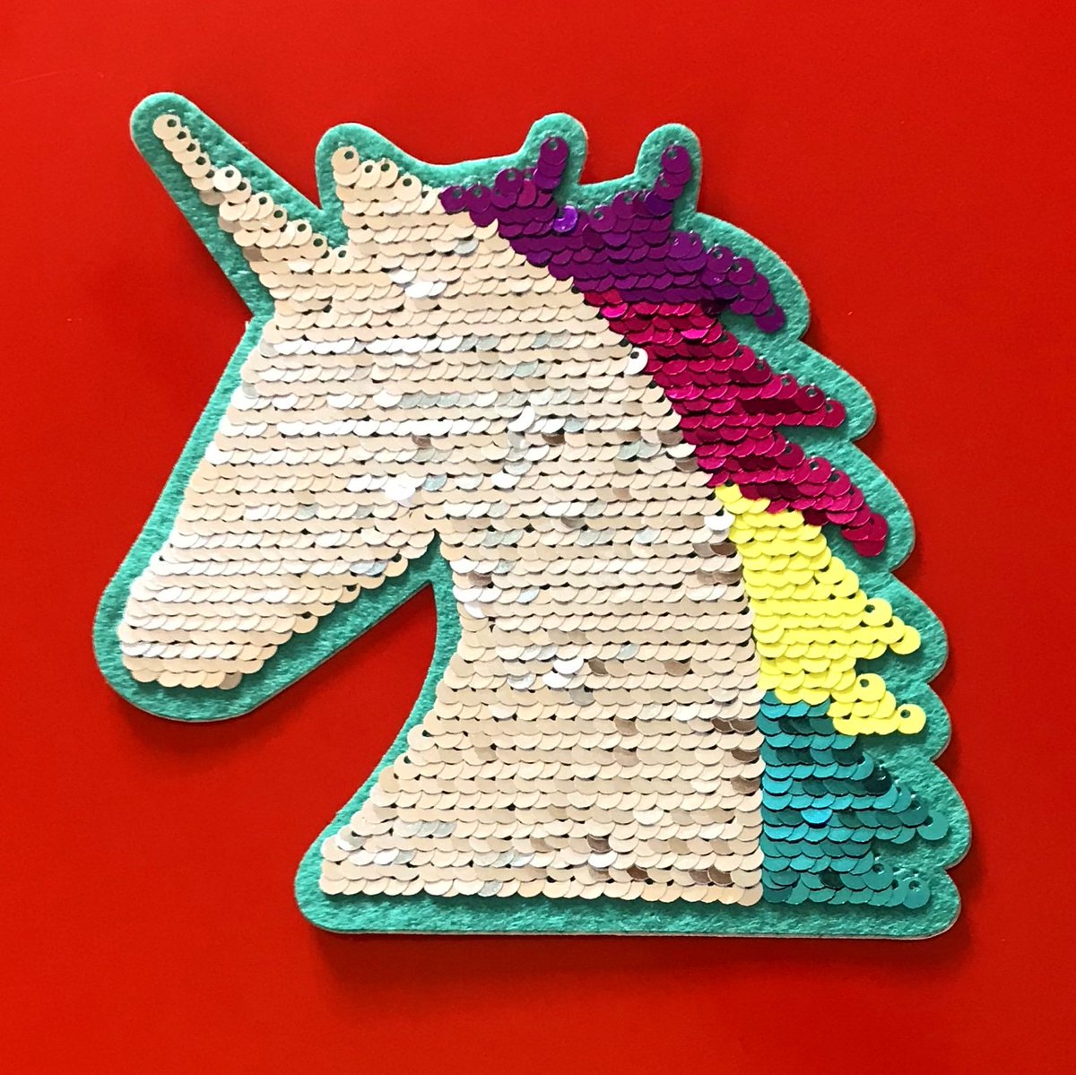 CardsRedback's tweet photo. Look who's just arrived at the Redback office...time to Shine!🌞
.
.
#FridayFeeling #weekendvibes #unicorn #reversiblesequins #greetingcards #red #silver #purple #redbackcards https://t.co/66s6GXehES