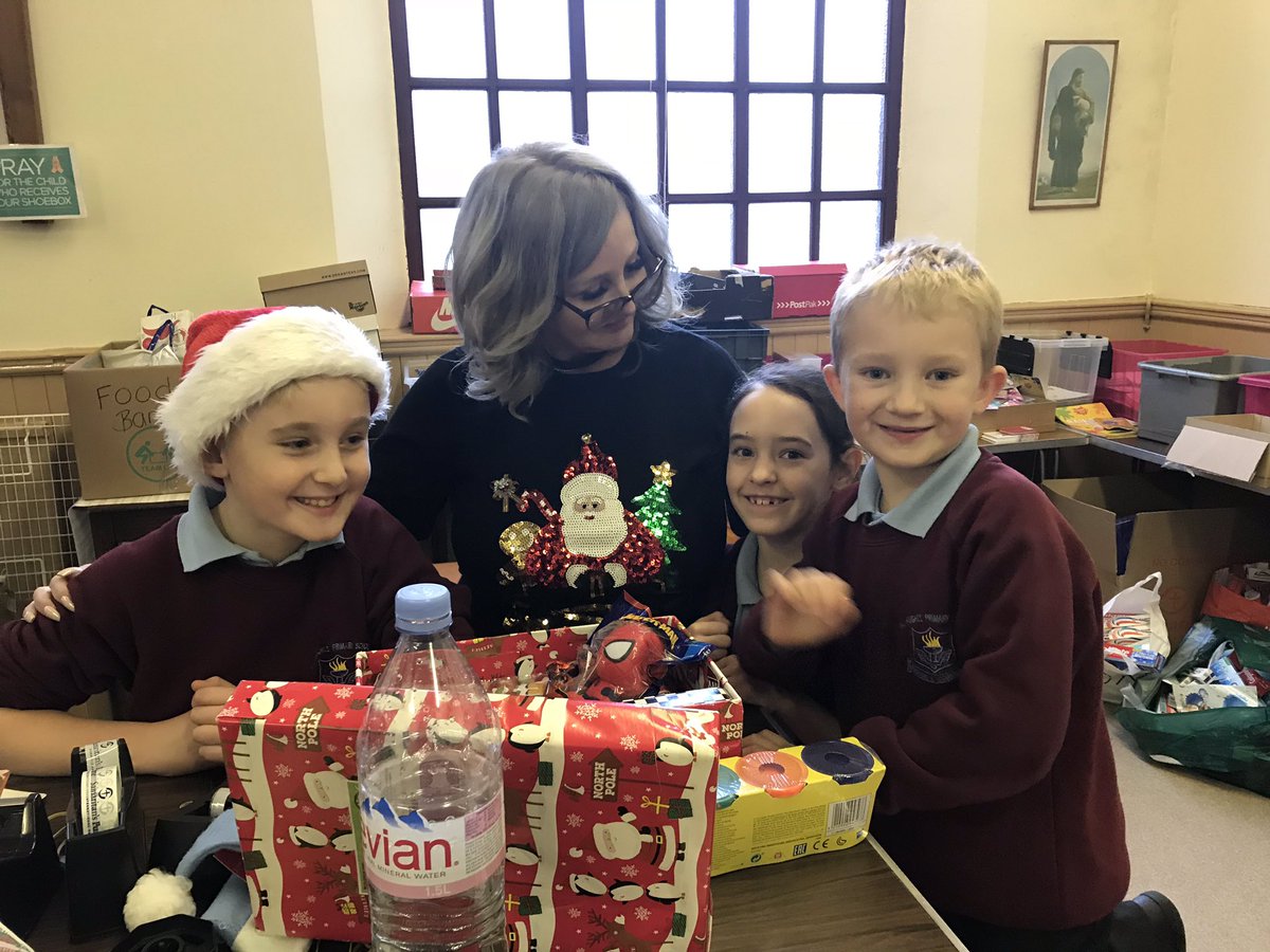 rlhughesAIM's tweet photo. The School Council are busy this afternoon helping pack boxes for #samaritanspurse #operationchristmaschild https://t.co/djXEOFiChq