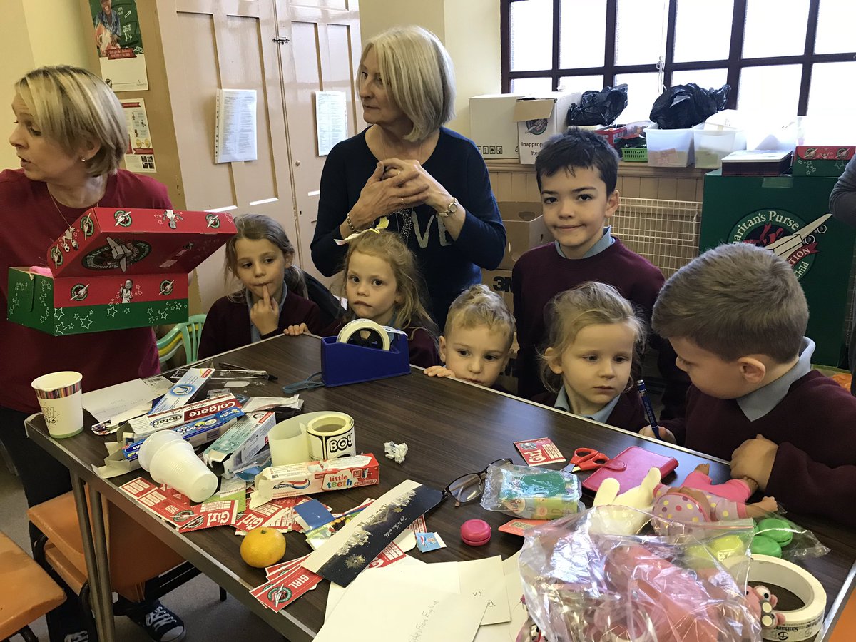 rlhughesAIM's tweet photo. The School Council are busy this afternoon helping pack boxes for #samaritanspurse #operationchristmaschild https://t.co/djXEOFiChq