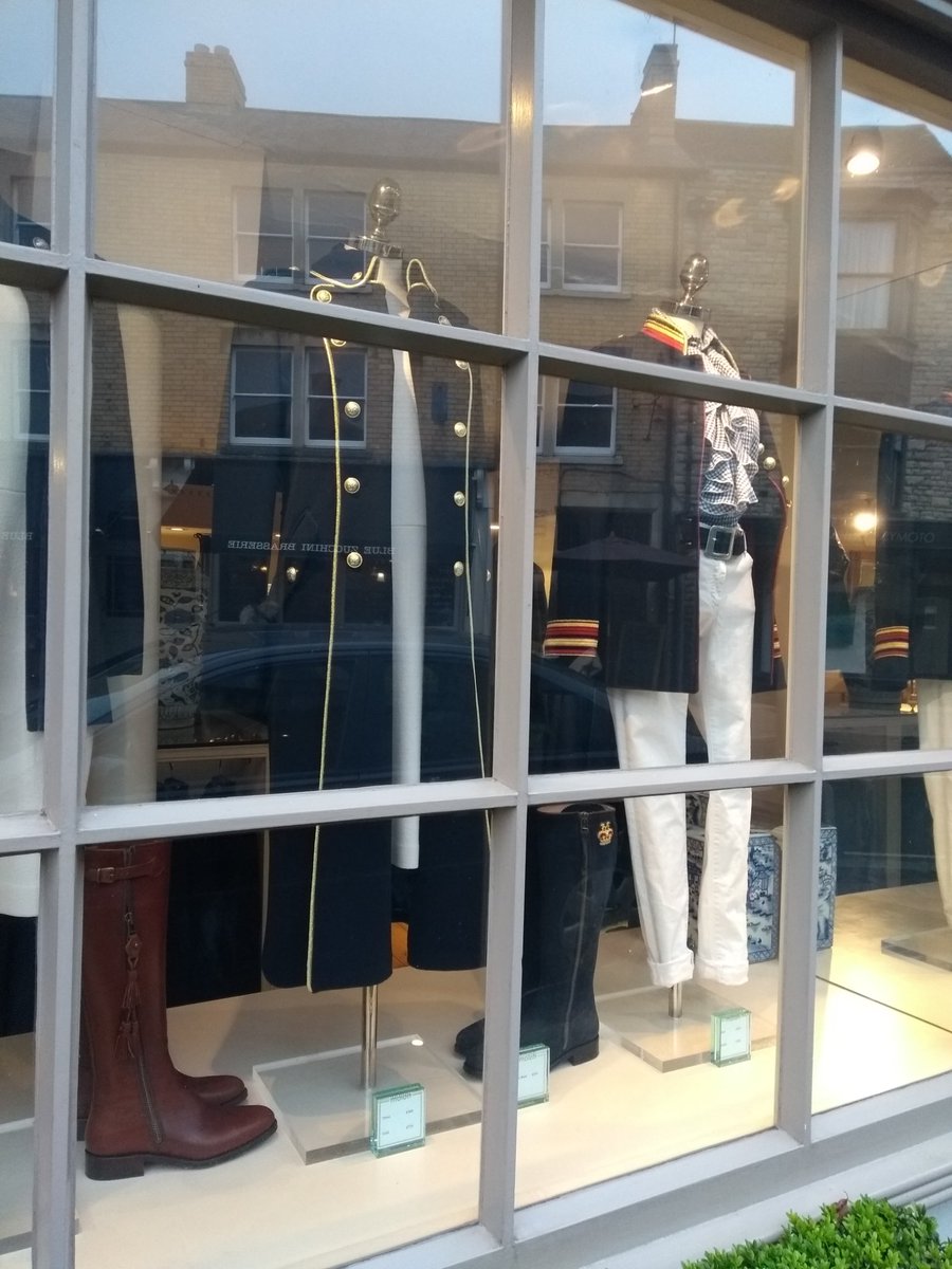 Scarfie1's tweet photo. I love these military jackets and crown boots in #moloh in #Tetbury. Very nice. https://t.co/CgCrq41ho1