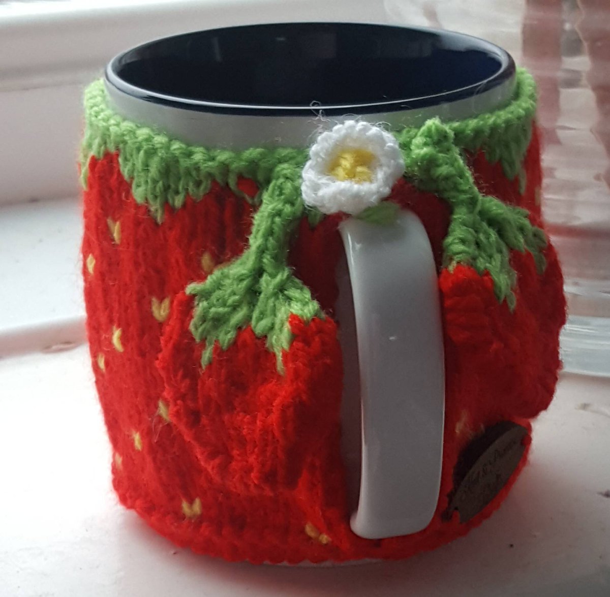 KnitandPromise's tweet photo. Loving my #mugcosy at the moment, great for those cold #winterevenings #mughug #etsy #knitted #strawberries #handmademugcosy #strawberrymugcozy #knittedcupcover #smeuk #knitandpromise #handmade #onlinecraft #onlinesales #FridayFeeling #britcraft https://t.co/pBWLRuybDP https://t.co/X09ZWoONND