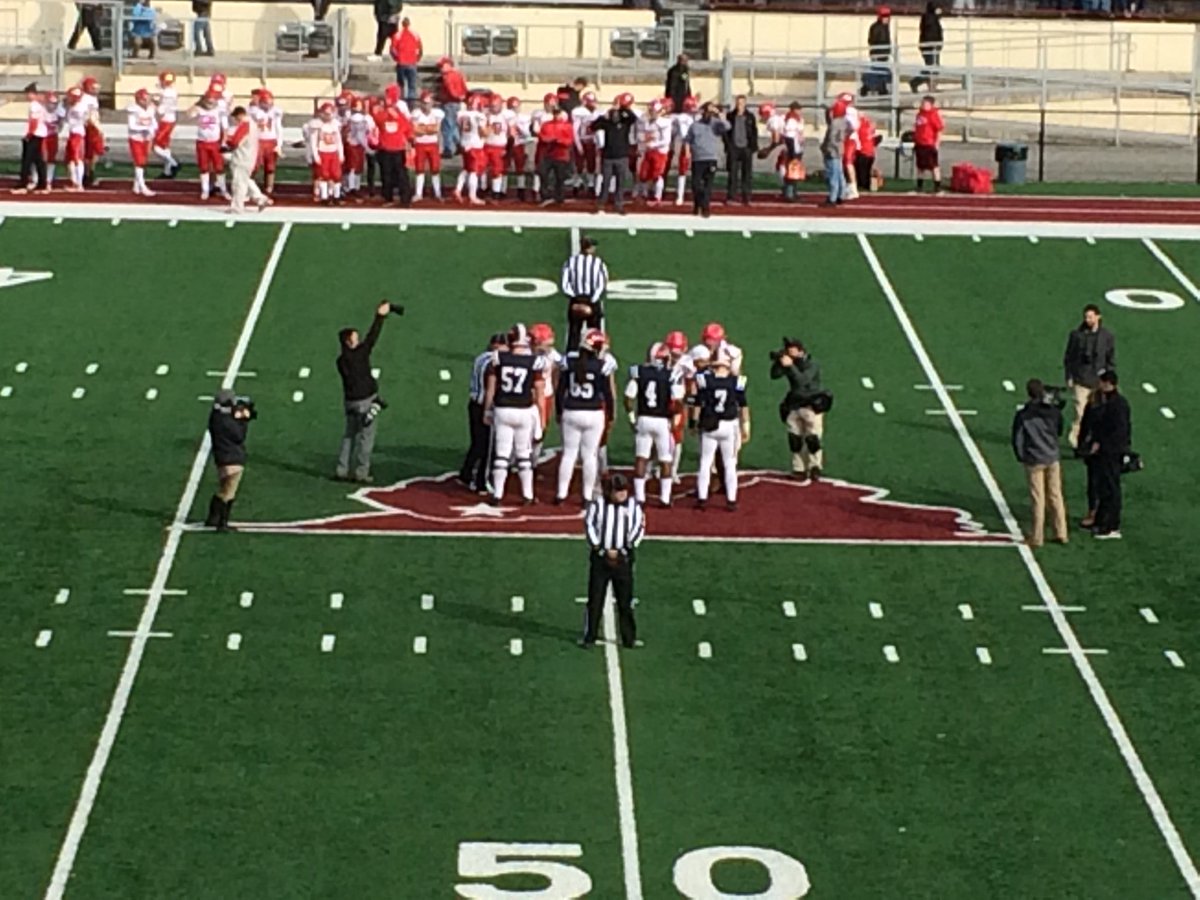 BDTBone's tweet photo. Captains meet for coin toss prior to Class AA semifinal between Bluefield Beavers and Bridgeport Indians at Mitchell Stadium. https://t.co/2rN38C0MqY