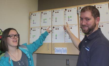 Byesvile_Club's tweet photo. Mid-East graphic arts program hosts Byesville Rotary. McKenzie Decker, Graphic Arts student, and Owen Williams, Graphic Arts instructor, examining student accomplishments recorded on “Badges Earned” records. #6690 #ByesvilleRotary https://t.co/8hWmL8RRXs