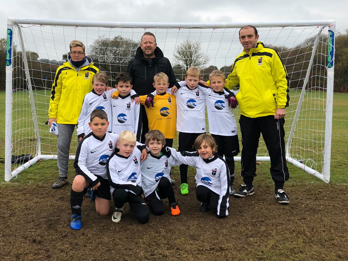 Goonhavern U8’s East wearing their new kit which is proudly sponsored by Corbey Construction.