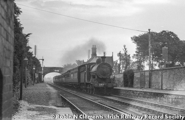 irishrailways's tweet photo. Then, as now, Irish railways play a major role in sporting activities, particularly big GAA fixtures; from the #SportingArchives, a Kilkenny-Dublin GAA excursion powers through #Hazelhatch on 26 June 1949. #GAA #EYA2018 #ExploreArchives @ARAIreland @explorearchives @IrishRail https://t.co/zv5nlNuEh4