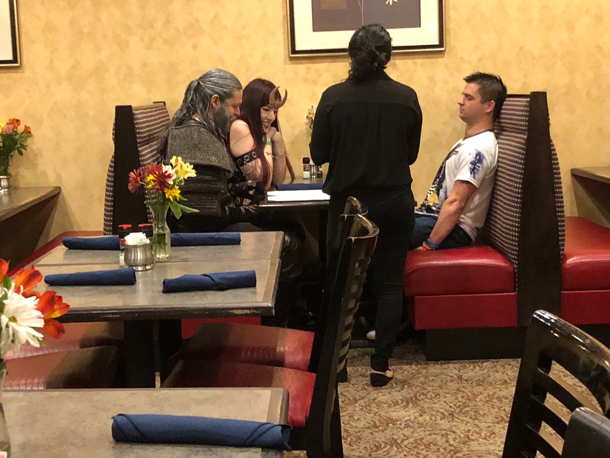 Young man mortified to be seen with his very nerdy parents