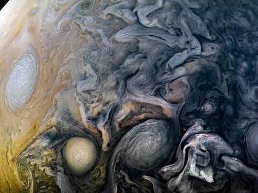This trippy shot of Jupiter was taken by the Juno spacecraft at an altitude of about 8,000 miles. The slate-and-dove colored whorls and Jupiter’s wavy clouds zigzag around each other towards the bottom of the frame. wired.trib.al/UGZmIqB 3/
