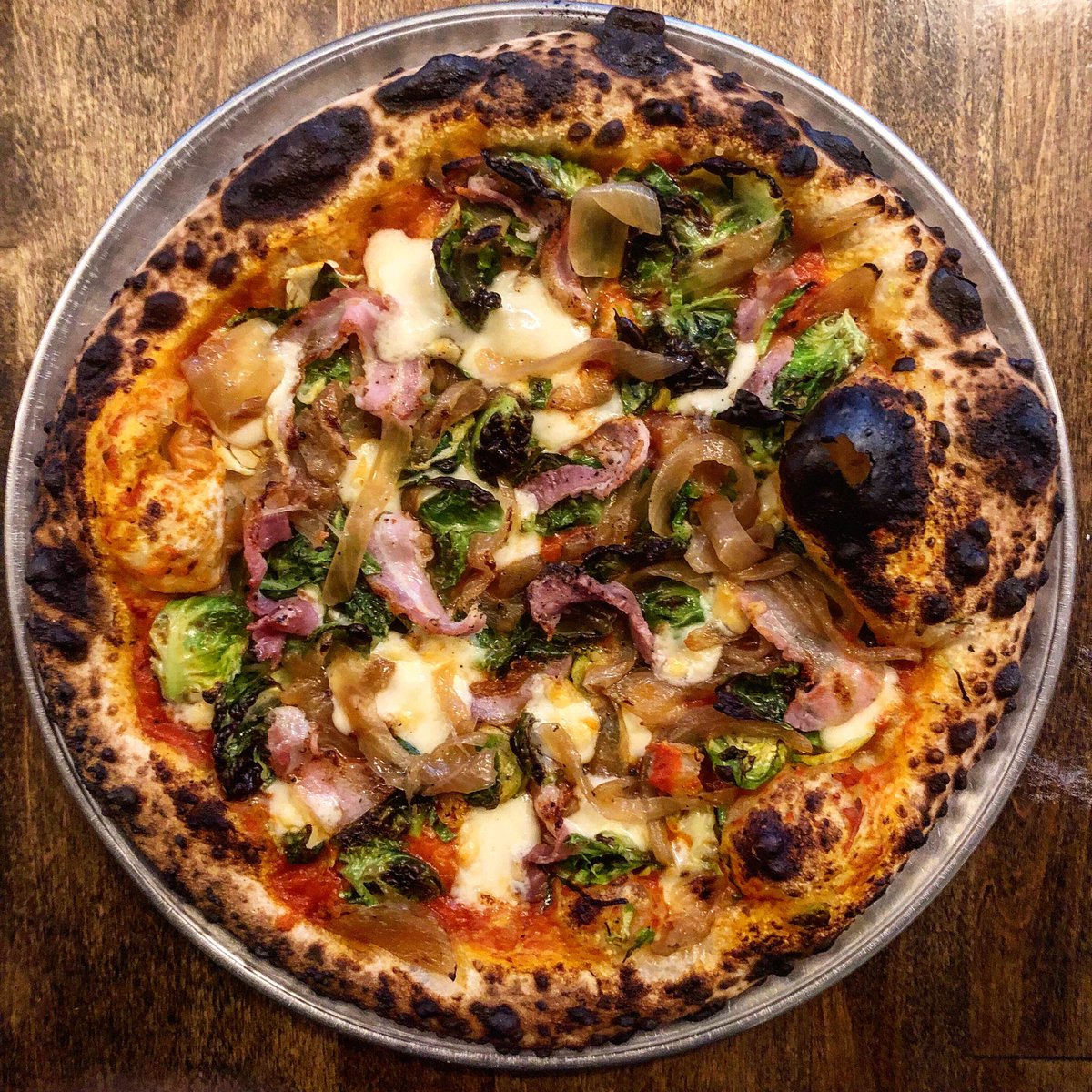 Our new Brussels sprout pizza is worth braving the rain for! 

#bufadpizza #phillyeatsgood #phillypizza