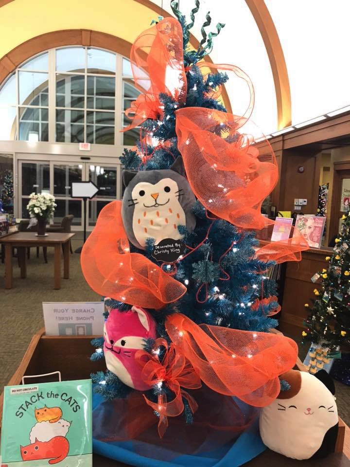boygirlparty's tweet photo. look at how cool this is! @townsendlibrary has a Stack the Cats themed Christmas tree! (c/o Christy King) https://t.co/wOUp483cEx