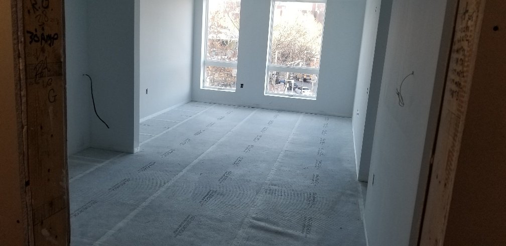 BerkeleyBuildCo's tweet photo. Gypcrete going down as we enter the final stretch of #Parcel9 project - #MelneaResidences in #Roxbury with @UrbanicaBoston. https://t.co/xl9u0tlvwr