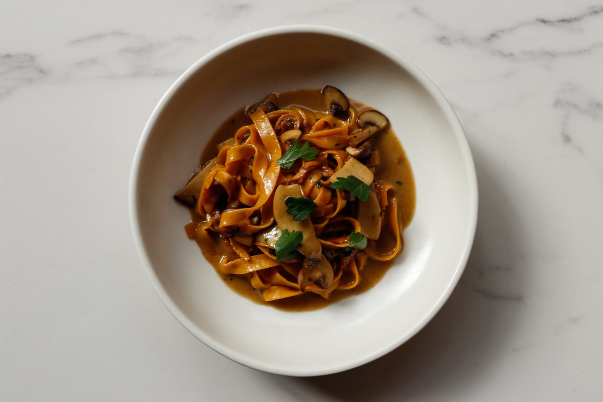 Fresh Egg Tagliatelle with Slow-Braised Scottish Girolles, Chanterelles and Porcini. This is made in a house mushroom stock featuring Marsala wine and finished with fresh-picked parsley.