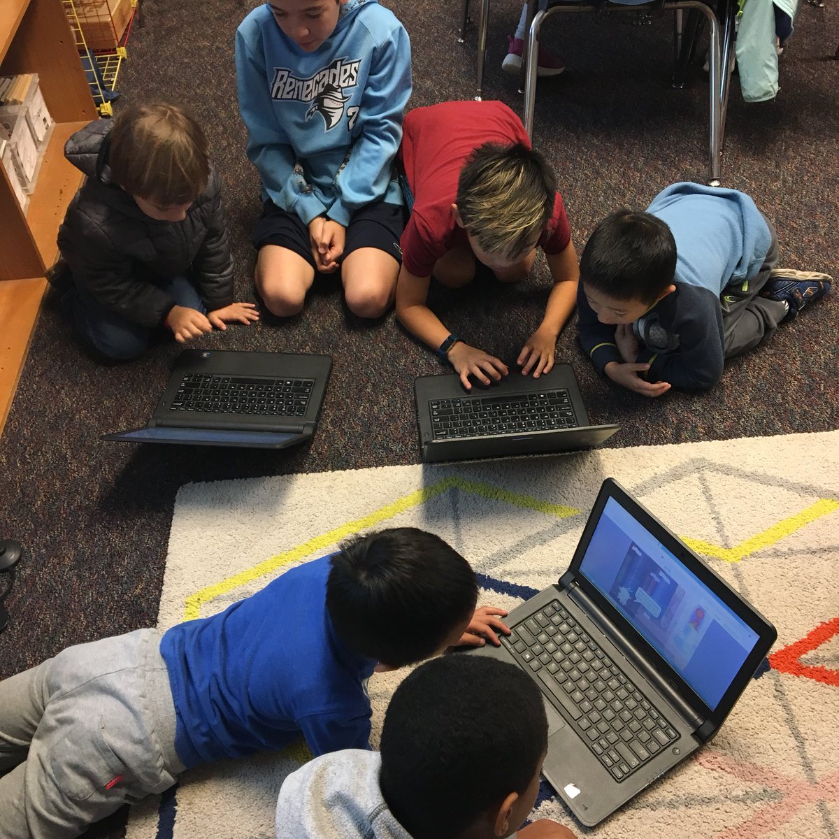 keatingkellie1's tweet photo. Mrs. Schuster’s 5th grade class supports and coaches our kinder class in our first taste of computer programming! #HourOfCode #SWEScodes #SWESinnovates #rrisdtech https://t.co/mfhpBKerFx